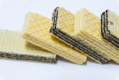 Close-up of cake against white background