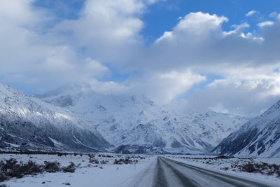 Scenic view of snowcapped mountains against sky