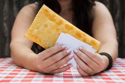 Close-up of woman holding ice cream