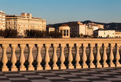 View of buildings in town against sky