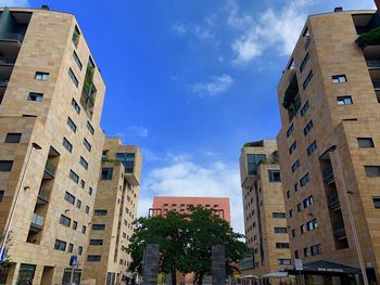 Low angle view of buildings against sky