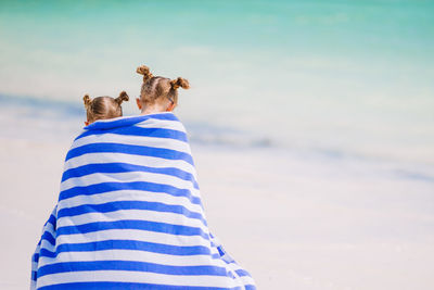 Rear view of woman looking at sea