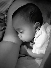 Cute baby sleeping on bed