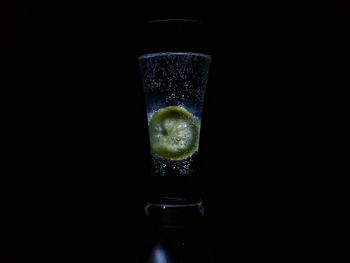 Close-up of drink against black background