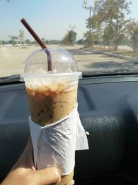 Midsection of person holding ice cream cone