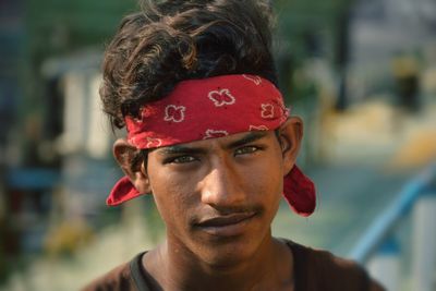 Close-up portrait of a serious young man