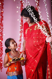 Daughter with mother during diwali