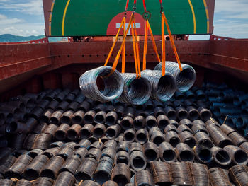 Discharging steel wire rod from cargo hold of the vessel.