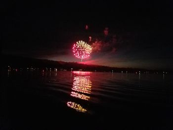 Firework display at night