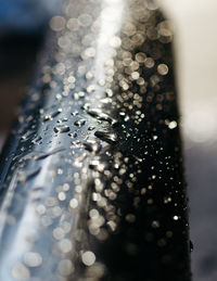 Close-up of water drops on table