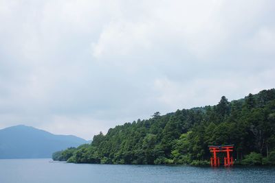 Scenic view of sea against cloudy sky