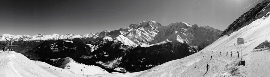 Scenic view of snow covered mountains