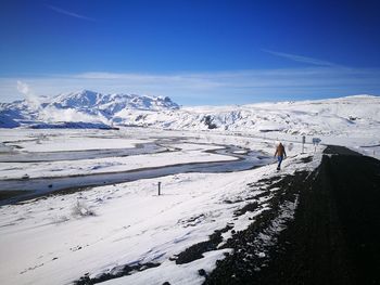 Scenic view of mountains against sky during winter