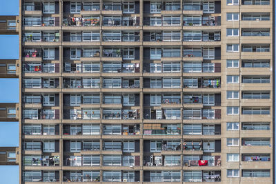 Facade of a brutalist style concrete tower block, trellick tower, in london, uk