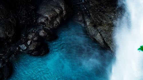 Close-up of water flowing through rocks