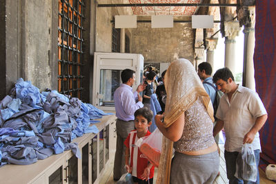 People at market stall