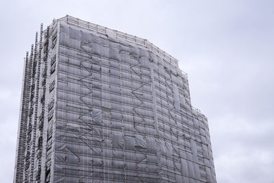 Low angle view of modern building against sky