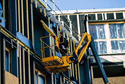 Low angle view of building against clear blue sky