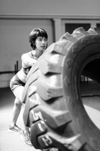 Portrait of boy standing in car
