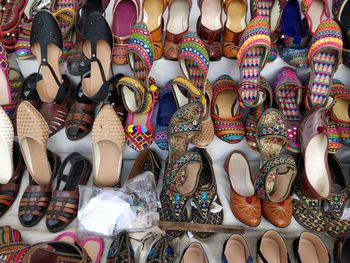 Low angle view of shoes for sale at market stall