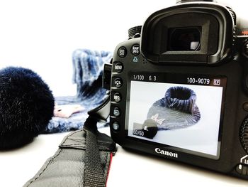 Close-up of man photographing