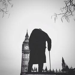 Statue of winston churchill with big ben