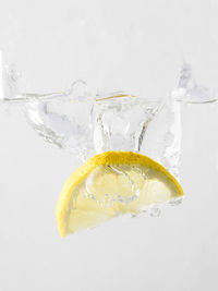 Close-up of drink against white background