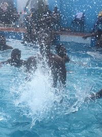 People swimming in pool