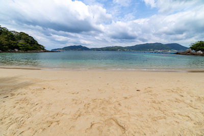 Scenic view of beach against sky