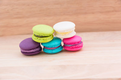 Close-up of multi colored macaron candies on table