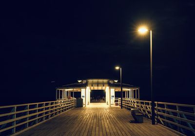 View of illuminated bridge at night