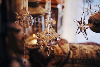 Close-up of lighting equipment hanging at store