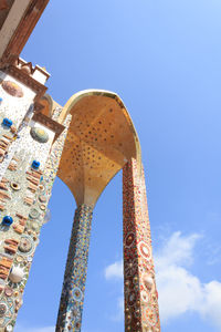 Low angle view of building against blue sky