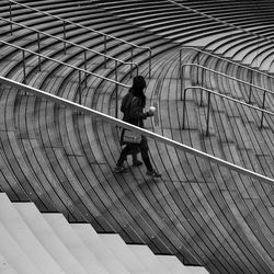 Low angle view of man standing on stairs