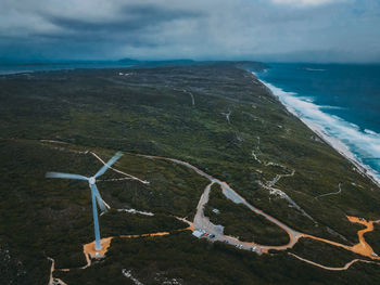 High angle view of land and sea against sky