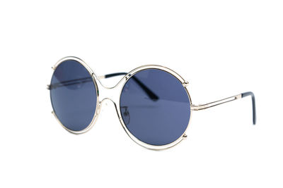 Close-up of sunglasses against white background