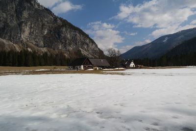 Scenic view of snowcapped mountains against sky