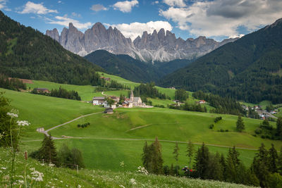 Scenic view of landscape and mountains against sky