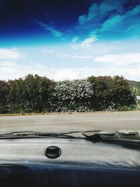 Road seen through car windshield