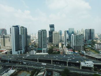 Modern buildings in city against sky