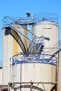 Low angle view of metallic structure against sky