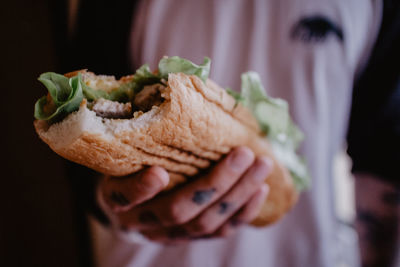 Close-up of hand holding food