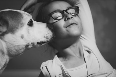 Close-up of man with dog