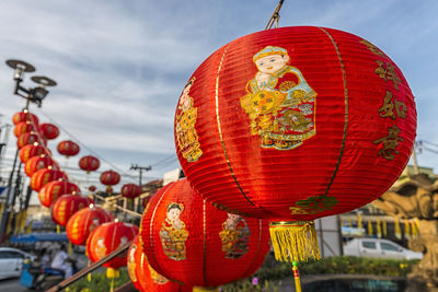 Red lanterns hanging against sky