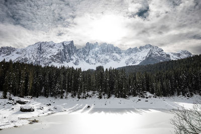 Scenic view of snowcapped mountains against sky