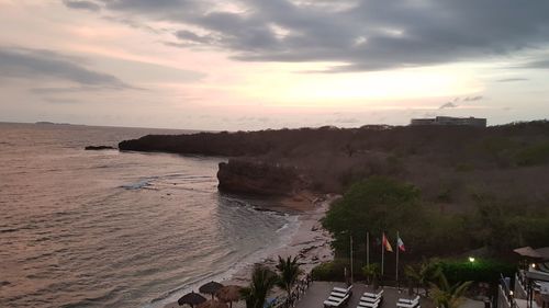 High angle view of beach against sky during sunset