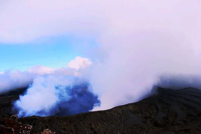 Panoramic view of volcanic mountain against sky
