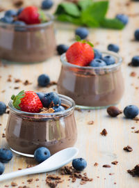 Chocolate dessert with strawberries and blueberries