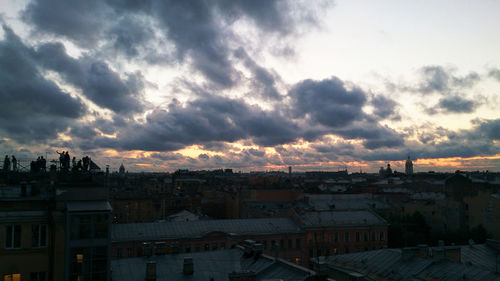 High angle view of townscape against sky at sunset