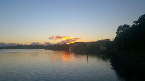Scenic view of calm sea at sunset